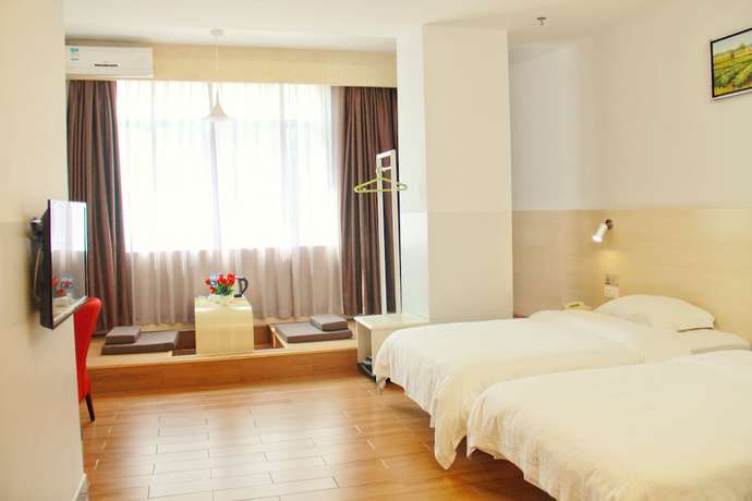 Imagen de la habitación del Hotel Wenxin Chaozhou. Foto 12