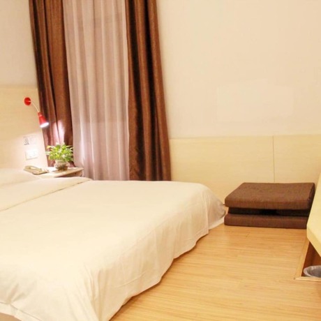 Imagen de la habitación del Hotel Wenxin Chigang. Foto 2