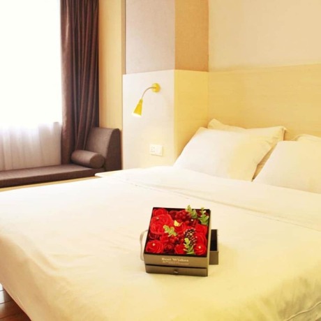 Imagen de la habitación del Hotel Wenxin Chigang. Foto 12