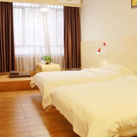 Imagen de la habitación del Hotel Wenxin Chigang. Foto 13
