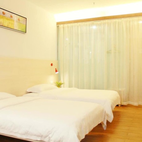 Imagen de la habitación del Hotel Wenxin Chigang. Foto 14