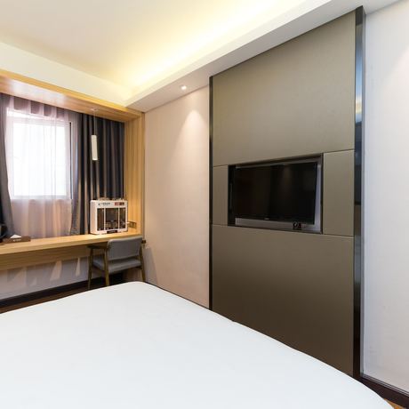 Imagen de la habitación del Hotel Wenxin Gangding. Foto 4