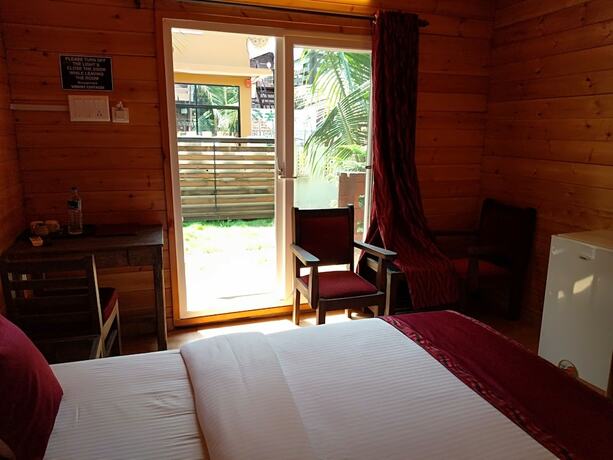 Imagen de la habitación del Hotel Wenzet Cottages. Foto 17