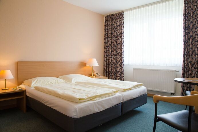 Imagen de la habitación del Hotel Werrapark Resort Haus Heubacher Hoehe. Foto 18