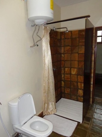 Imagen de la habitación del Hotel Weru Weru River Lodge. Foto 16