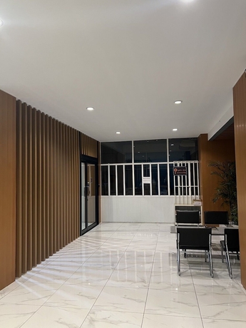 Imagen de los interiores del Hotel Wesah Home Place. Foto 14