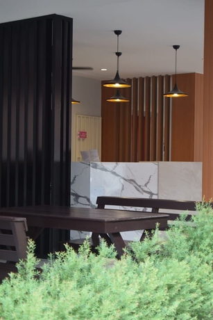 Imagen de los interiores del Hotel Wesah Home Place. Foto 15