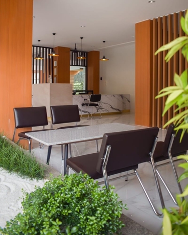 Imagen de los interiores del Hotel Wesah Home Place. Foto 16