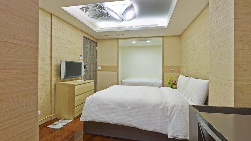 Imagen de la habitación del Hotel West 59 Inn. Foto 17
