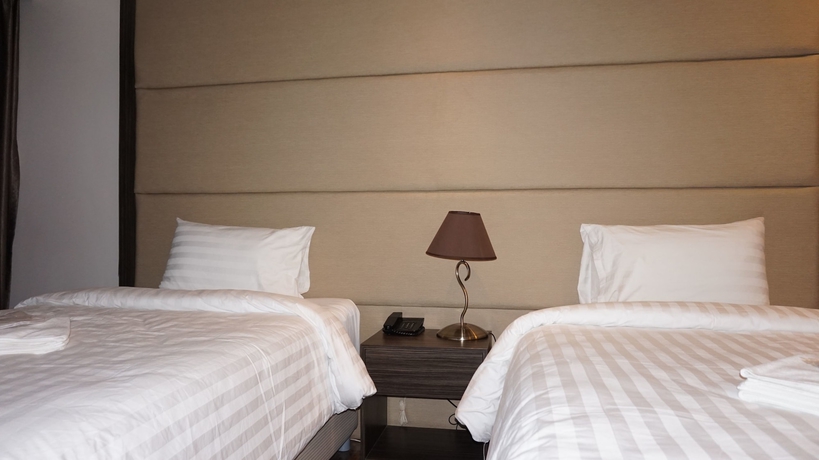 Imagen de la habitación del Hotel West Avenue Suites. Foto 3