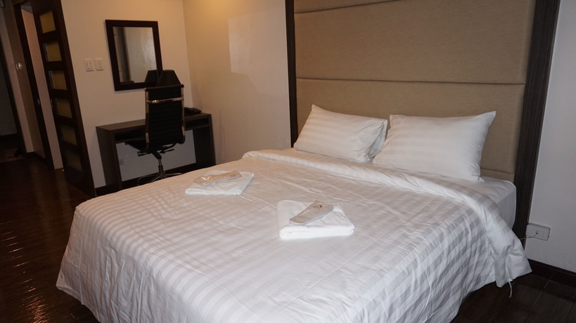 Imagen de la habitación del Hotel West Avenue Suites. Foto 4
