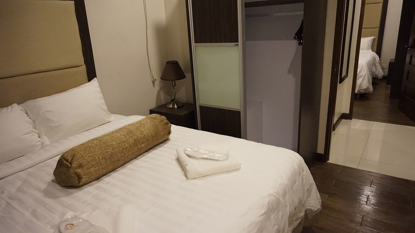 Imagen de la habitación del Hotel West Avenue Suites. Foto 10