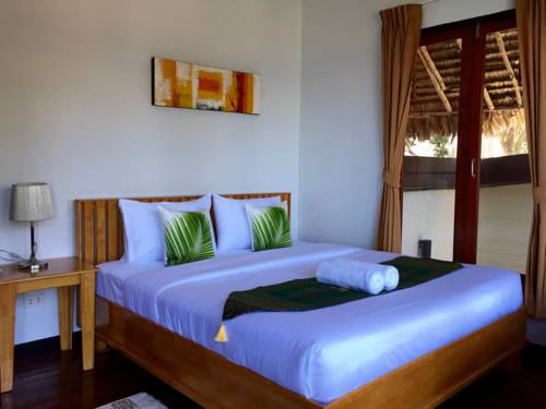 Imagen de la habitación del Hotel West Coast Beach Resort Koh Phangan. Foto 4