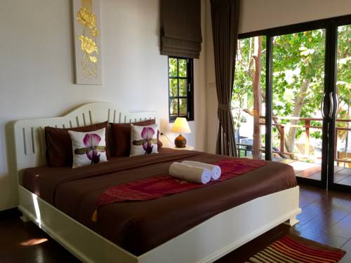 Imagen de la habitación del Hotel West Coast Beach Resort Koh Phangan. Foto 12