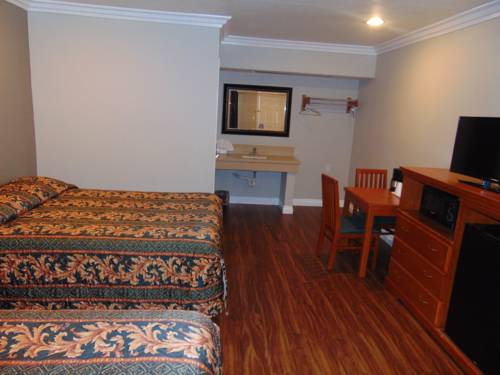 Imagen de la habitación del Hotel West Coast Inn. Foto 10