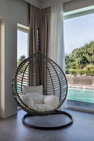 Imagen de la habitación del Hotel West East Suites. Foto 16