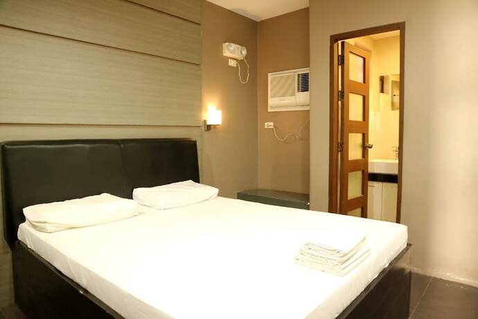 Imagen de la habitación del Hotel West Gate. Foto 18