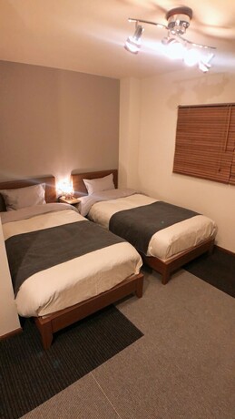 Imagen de la habitación del Hotel West Kumegawa. Foto 2