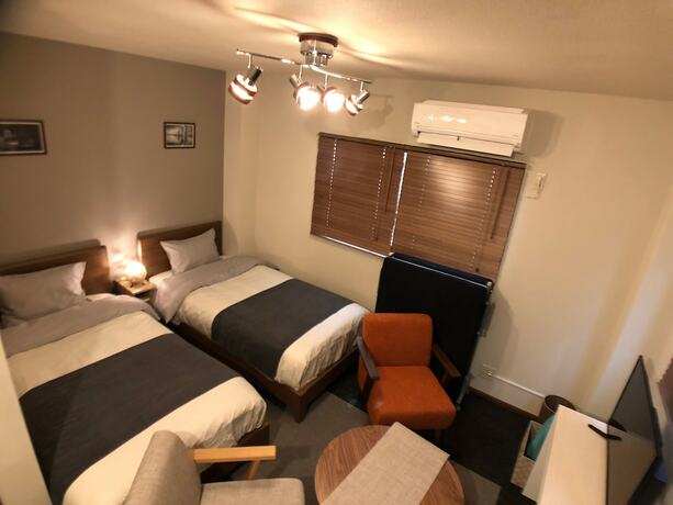 Imagen de la habitación del Hotel West Kumegawa. Foto 11