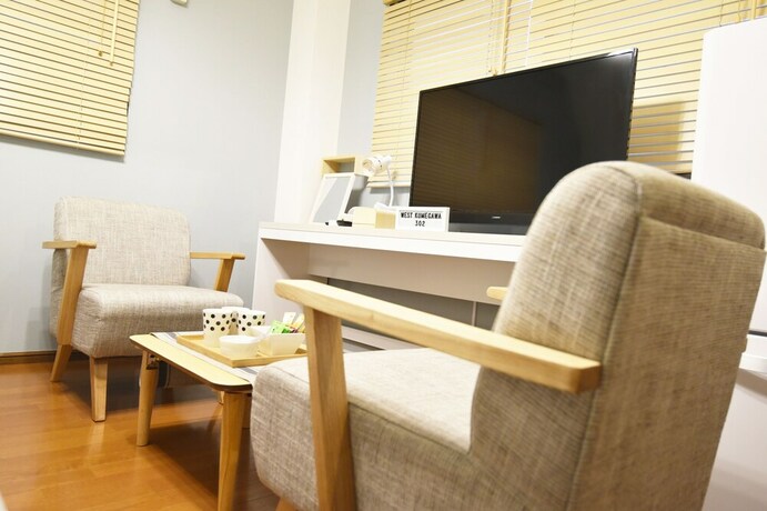 Imagen de la habitación del Hotel West Kumegawa. Foto 13