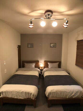 Imagen de la habitación del Hotel West Kumegawa. Foto 15