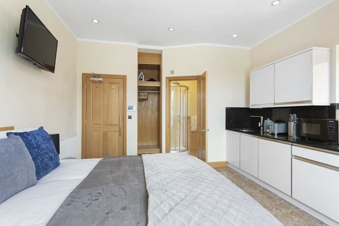 Imagen de la habitación del Hotel West One Studios. Foto 18