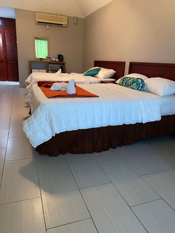 Imagen de la habitación del Hotel West Palm. Foto 13