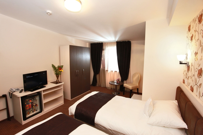 Imagen de la habitación del Hotel West Plaza, Bucarest. Foto 8