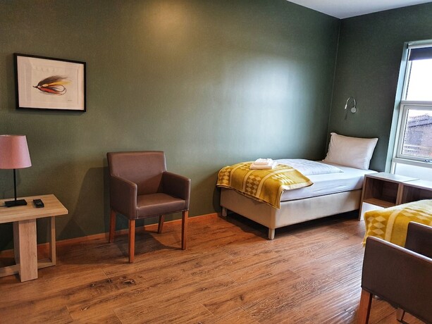 Imagen de la habitación del Hotel West Ranga lodge. Foto 17