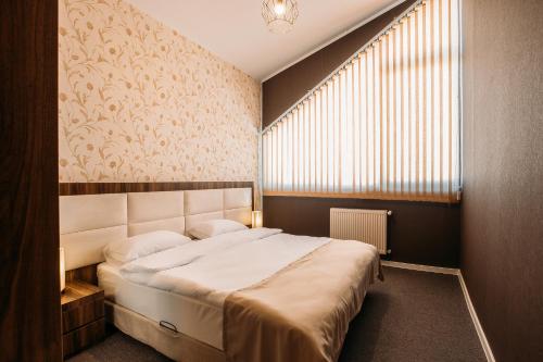 Imagen de la habitación del Hotel West, Tbilisi. Foto 7