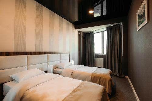 Imagen de la habitación del Hotel West, Tbilisi. Foto 10