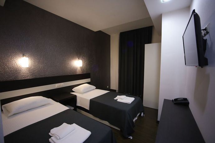 Imagen de la habitación del Hotel West Tower Hotel. Foto 6