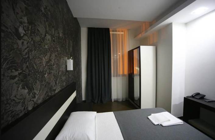 Imagen de la habitación del Hotel West Tower Hotel. Foto 9
