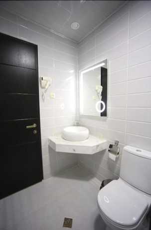 Imagen de la habitación del Hotel West Tower Hotel. Foto 13