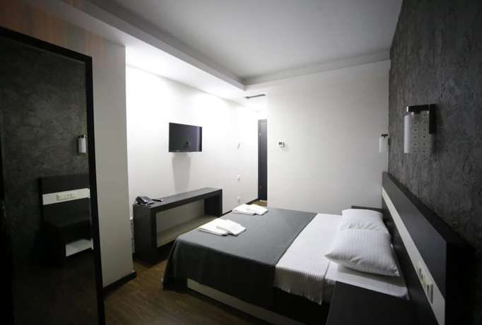 Imagen de la habitación del Hotel West Tower Hotel. Foto 15