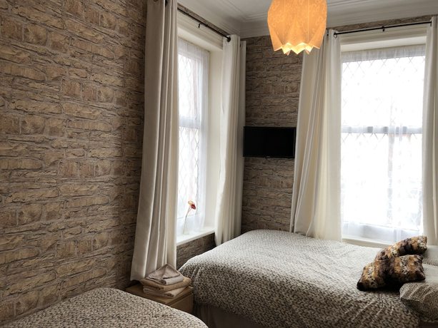 Imagen de la habitación del Hotel West Vale Villa. Foto 11