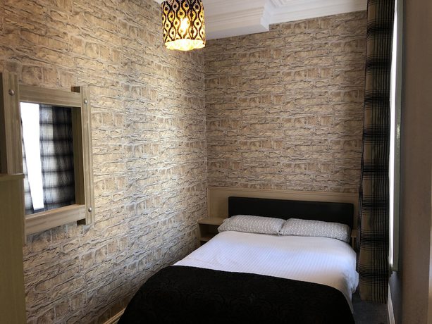 Imagen de la habitación del Hotel West Vale Villa. Foto 16
