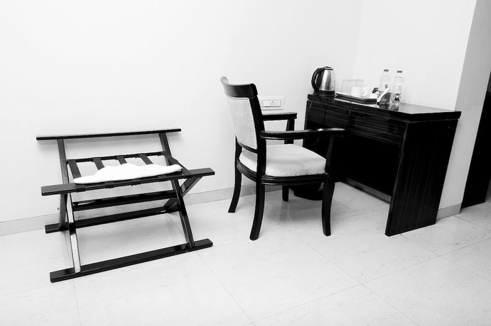 Imagen de la habitación del Hotel West View, Bhilad. Foto 7