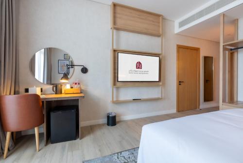 Imagen de la habitación del Hotel West Walk Retaj. Foto 17