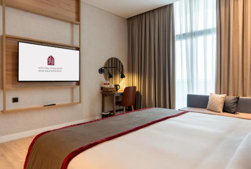 Imagen de la habitación del Hotel West Walk Retaj. Foto 19