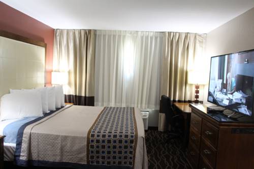 Imagen de la habitación del Hotel Westbridge Inn and Suites. Foto 5