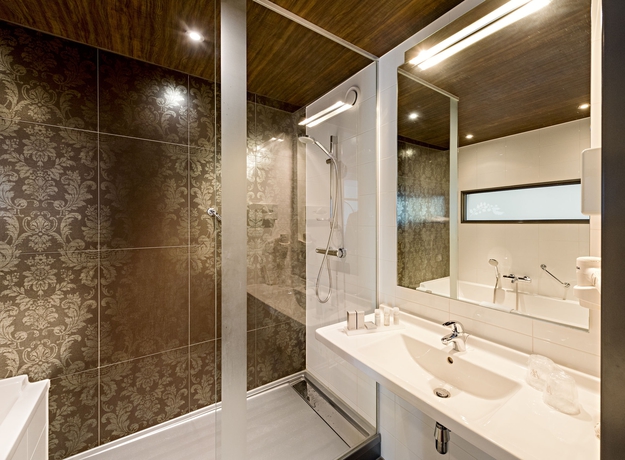 Imagen de la habitación del Hotel Westcord Fashion Amsterdam. Foto 7