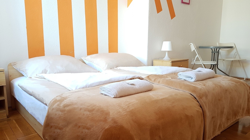 Imagen de la habitación del Hotel Westend Minihotel. Foto 13