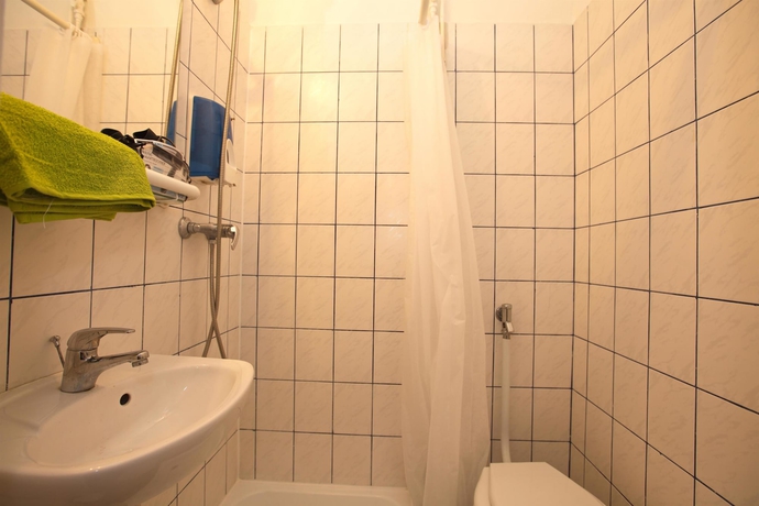 Imagen de la habitación del Hotel Westend Minihotel. Foto 17