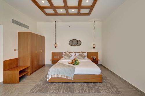 Imagen de la habitación del Hotel Western Liwa. Foto 15