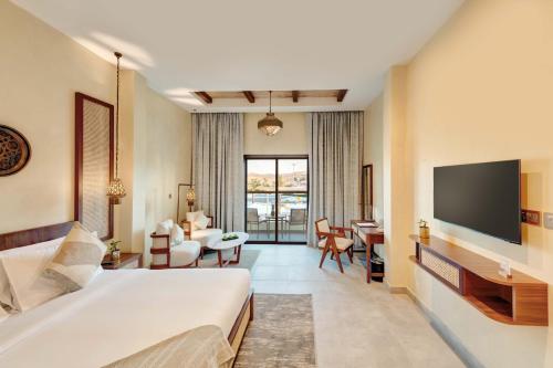 Imagen de la habitación del Hotel Western Liwa. Foto 17