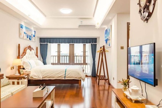 Imagen de la habitación del Hotel Western Theme Holiday Apartment. Foto 2