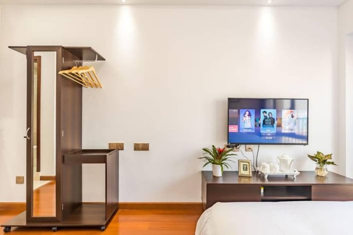 Imagen de la habitación del Hotel Western Theme Holiday Apartment. Foto 8