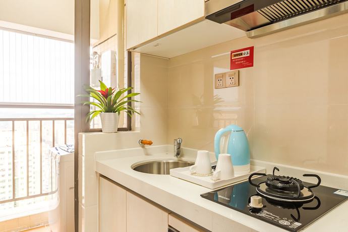 Imagen de la habitación del Hotel Western Theme Holiday Apartment. Foto 9