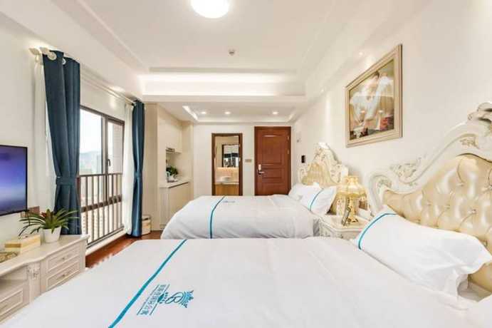 Imagen de la habitación del Hotel Western Theme Holiday Apartment. Foto 14
